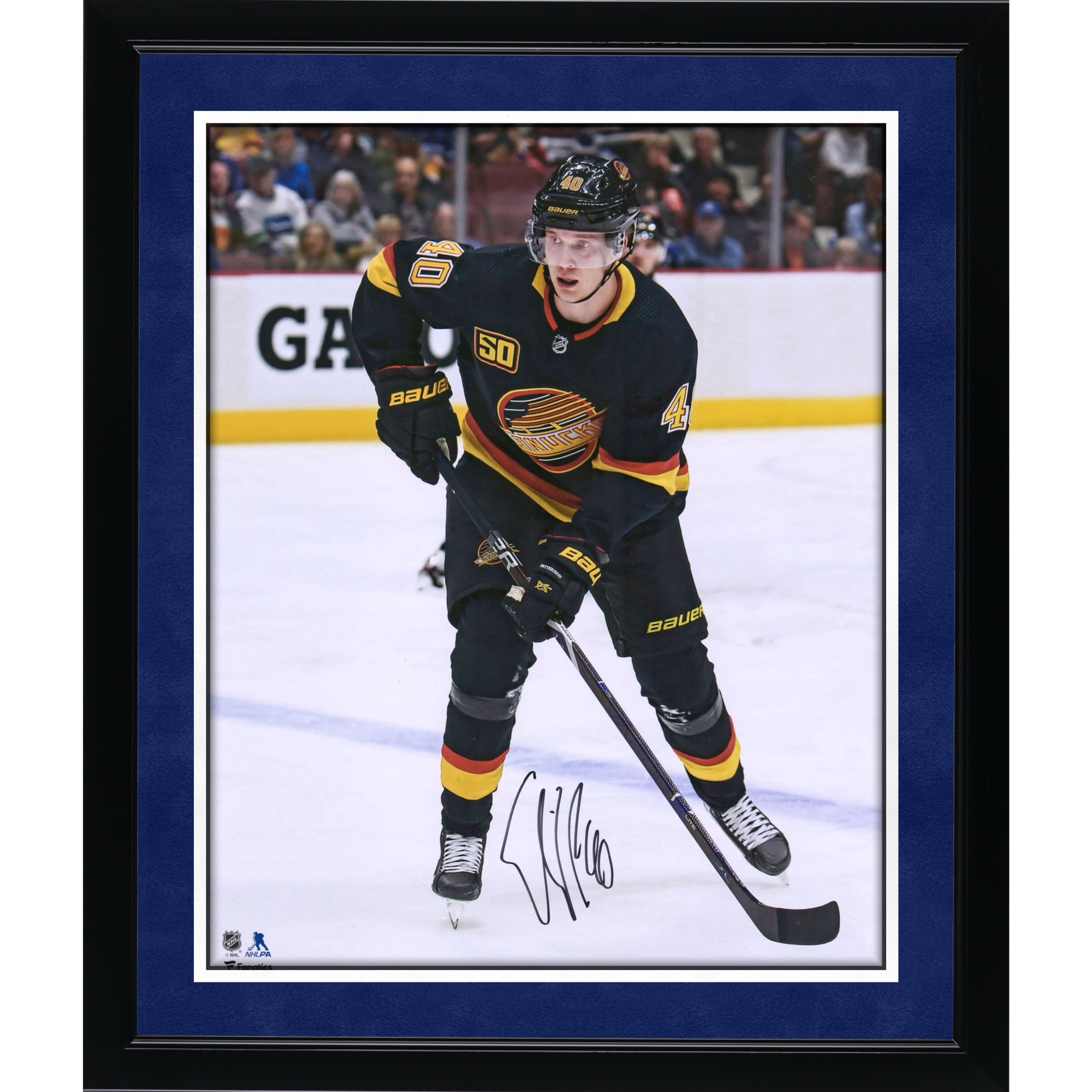 Elias Pettersson Vancouver Canucks Autographed 16" x 20" Black Alternate Jersey Skating Photograph